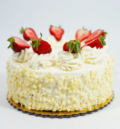 Fruit cake with strawberry topping, 1 lb (1/2 kg). (substitutions may apply if item not available)