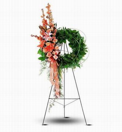 Wreath Shaped Stand with Lilies, Roses, Stock and Greenery fillers.