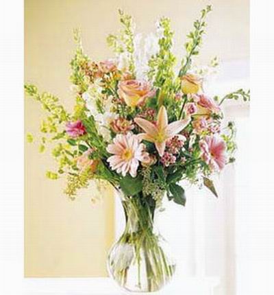 6 Pink Roses, 2-3 pink Lily buds, 3 Chrysanthemums, Stock and green filers
