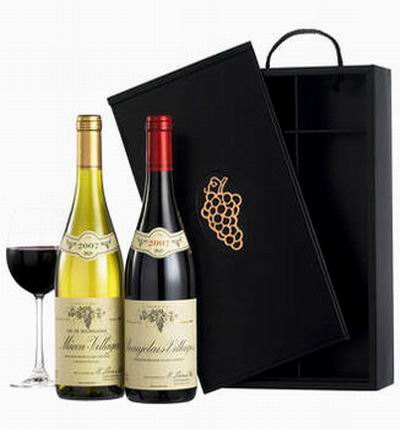 1 bottle of red wine, 1 bottle of white wine. Wine based on local wine selection. Brands will vary.  (Photo image is only an example)
