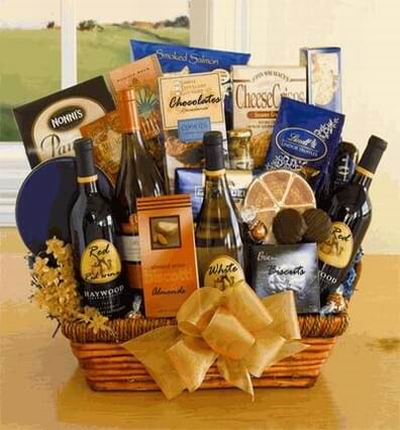 2 bottles of red wine and 2 bottles of white wine with smoked Salmon, Cheese, Crackers, Almonds, Ghirardelli chocolates, Cheese crackers, and biscuts. Wine based on local wine selection. Brands will vary.  (Photo image is only an example)