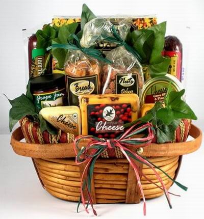 Basket of nuts, bread crackers, three types of cheese, Salami sausage stick 250g, beef sausage 250g and grape jam.