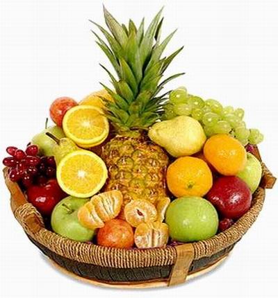 Fruit Basket of 1 Pineapple, 2 red Apples, 4 green Apples, 3 Oranges, 2 Pears, 2 Peaches, Finger Grapes and Globe Grapes.