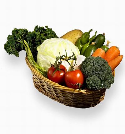 Basket of Vegetables. 1 Lettuce head, 2 Tomatoes, 3 Carrots, 3 Cucumbers, 3 green Peppers, 1 Potato, 1 bunch of Broccoli, 2 bunches of Parsley.