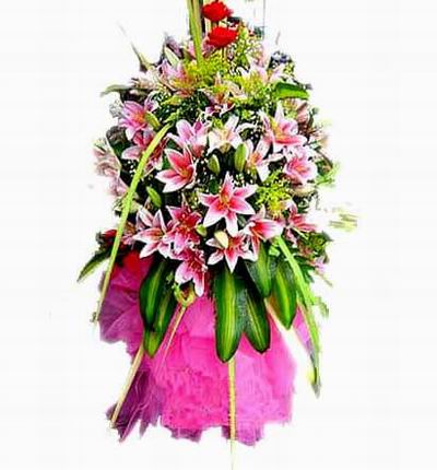 Flower Stand of Lilies and Roses with large leaves (Substitutions may apply if a flower item is unavailable)