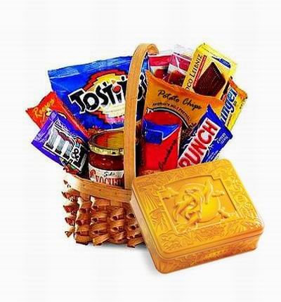 A box of Premium Mooncakes and a Basket of serious snacks. Doritos chips, Crunch chocolate bar, Butterfinger bar, packaged Chocolate cake roll, Crackers with cheese (Ritz), Salsa Sauce for the Chips, M&Ms, Reese's candy and Potato Chips.