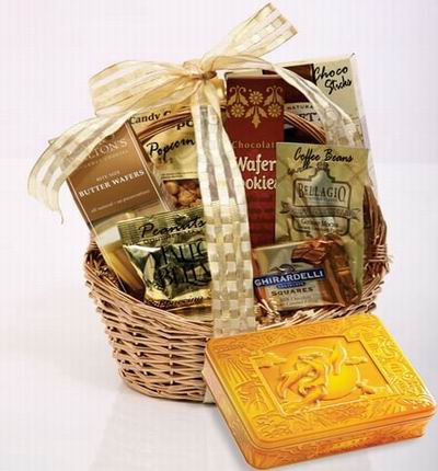 A box of Premium Mooncakes and a Basket with Ghirardelli Square chocolates, Butter Wafers, Wafer Cookies, peanuts, Candy Popcorn and chocolate sticks.