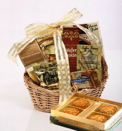 A box of Standard Mooncakes and a Basket with Ghirardelli Square chocolates, Butter Wafers, Wafer Cookies, peanuts, Candy Popcorn and chocolate sticks.