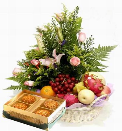 A box of Premium Mooncakes and a Flower basket of 8 pink roses, 3 open pink Lily buds surrounded by green leaves and fillers with Globe Grapes, 1 Orange, 3 Dragon Fruits, 1 Star Fruit, 1 yellow Fuji Apple, 1 Peach and 1 Cantaloupe.