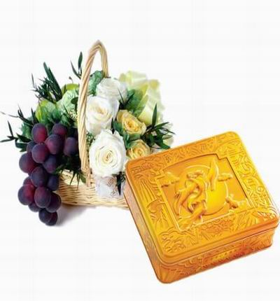 A box of Premium Mooncakes and a Premium Mooncakes with a fruit and flower basket of 3 cream Roses, 3 yellow Roses, purple Grapes, Baby's Breath and Greenery.