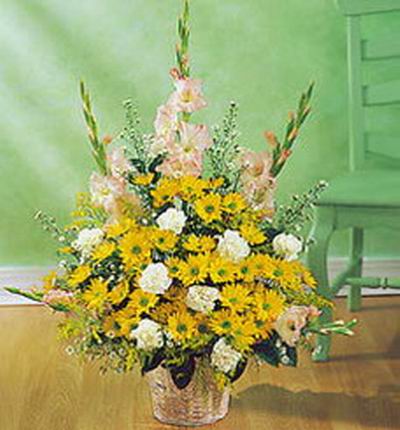 Bunch of yellow Chrysanthemums,white Carnations,Baby Breath and gladiolus in basket