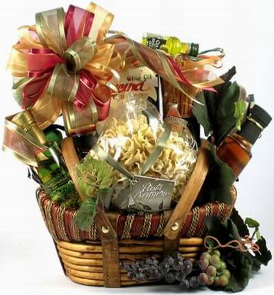 A basket of dried Pasta Shells and Pasta noodles, Olive Oil and Vinegar.