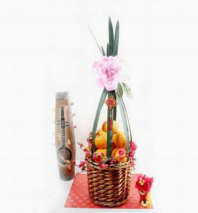 Basket of 8 Mandarin Oranges wrapped with leaves and flowers.
