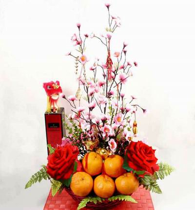 Lunar New Year flowers and 5 Mandarin oranges in basket. Background item not included.
