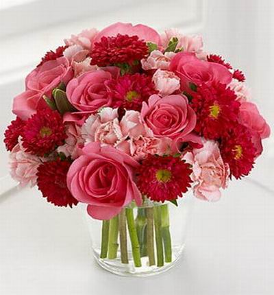 7 pink roses, 9 light pink carnations and 10 red Chysanthemum Firestorm