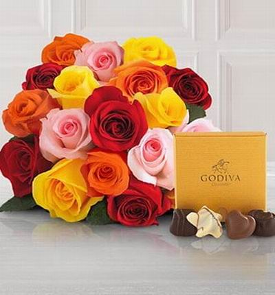 18 assorted color Roses with a box of Godiva Chocolates.