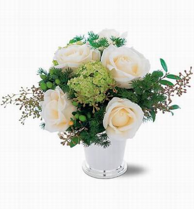 5 cream color Roses, viburnum and a mix of green fillers.