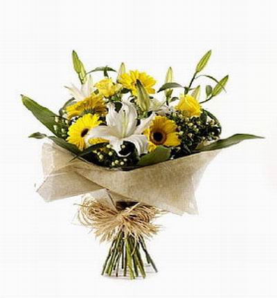 3 Sunflowers, 3 Lilies and 3 yellow Roses with Baby's Breath.