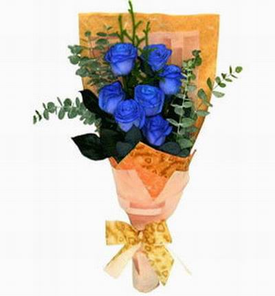 7 blue Roses with greenery.