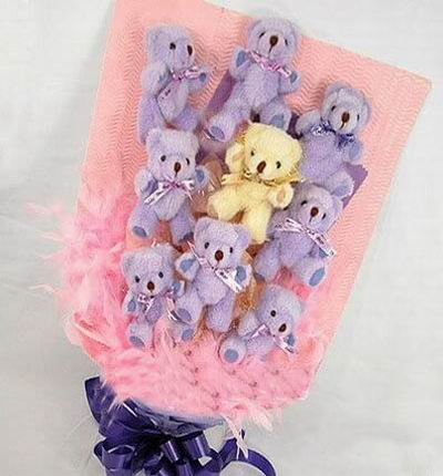 9 mini 10cm teddy bear bouquet with feather fillers.