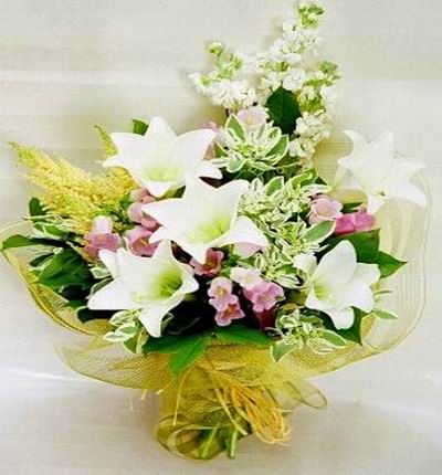 5 open white Lily buds, pink morning glory, Greens and fillers in premium wrapping