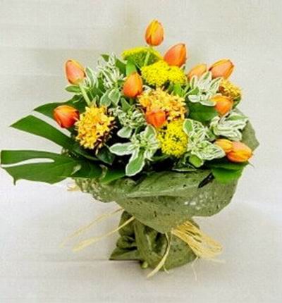 12 orange Tulips and some grasses in premium wrapping
