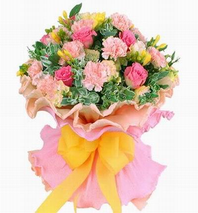 10 pink Carnations, 5 pink Roses and yellow Freeasias and greenery fillers.