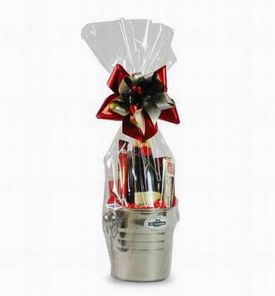 A gift in itself. A bottle of wine wrapped in beautiful wrapping with mini chocolate snacks.