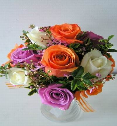 White, orange and purple Roses.