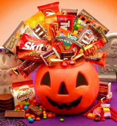 A  pumpkin full of candy treats and chocolates