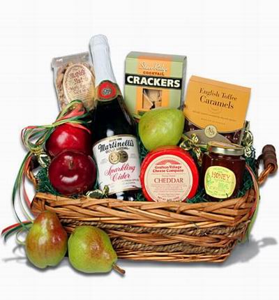 Orchard Fresh Fruits - Assorted Selection of Red Delicious Apples and Red Bartlett Pears. Know that only the best make it into our fruit baskets. Maple Sugared Nut Mix - Bagged 4 oz., Jar of Honey With Comb 8 oz., Cheese Cheddar - 1 year 8 oz.,Martinelli'