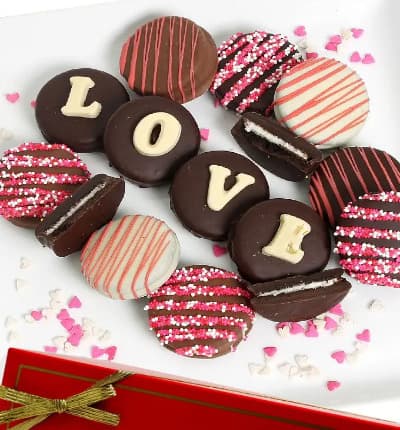 The best of the best. Belgian Chocolate beautifully covering wonderful OREOS is the perfect gift for your love. Whether it's for a Birthday, Valentine's Day, or Anniversary they will know you love them when you send them this romantic and tasty gift. LOVE Belgian Chocolate Covered OREO Cookies - 12 Pieces.
Includes:
* Edible Love Chocolate Message
* Pink and Red Sprinkles
* Twelve Oreo Cookies
* Milk, Dark and White Chocolate.
ALLERGEN ALERT: Product contains egg, milk, soy, wheat, peanuts, tree nuts and coconut. We recommend that those with food related allergies take the necessary precautions.
