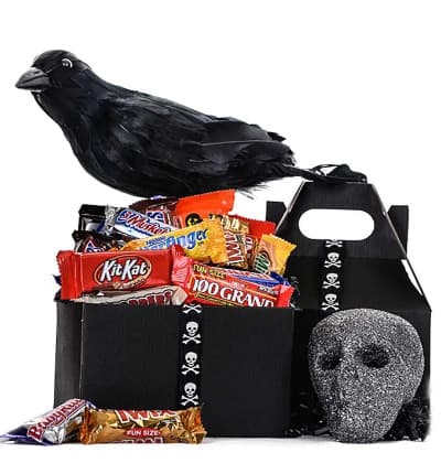 A black box filled to the brim with Halloween sweets will not disappoint the candy lover in your life! Send today and surprise your loved one with a sweet Halloween box full of treats. Please note skull and bird not included.

Includes:
* Kit Kats
* Butterfingers
* 100 Grand Bars
* 3 Muskeeteers
* Twix Bars
* Milky Ways
* Decorative Halloween Box
* And Much More